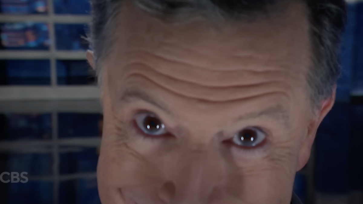 Stephen Colbert mocks Trump's giant banner